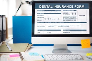 Dental insurance form on computer monitor