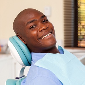 Man smiling in dental chair