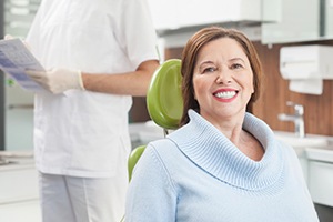 Older woman smiling in dental chair