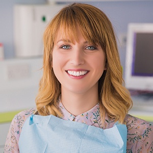 Woman smiling after cosmetic dentistry