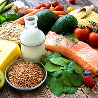 Variety of healthy foods collected together on tabletop