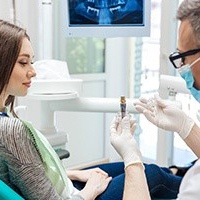 Dentist and patient discussing the cost of dental implants in Northborough 