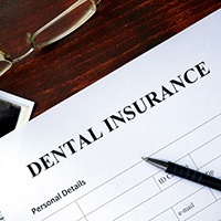 Insurance paperwork for the price of dental implants in Northborough