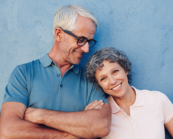 Senior man and woman smiling together