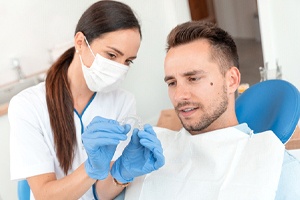 Male patient learning about the cost of Invisalign in Northborough