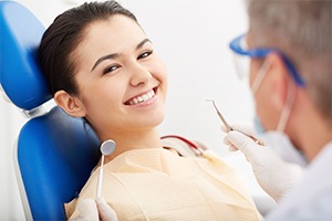 Woman receiving dental checkup