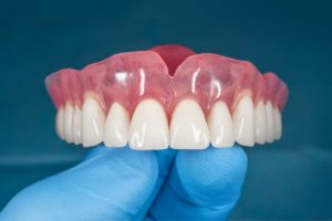 Dentures, a treatment often involved in full mouth reconstruction