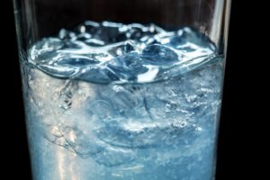 Glass of ice water that can ease Invisalign discomfort in Northborough