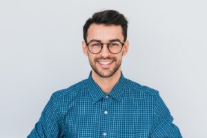 Portrait of smiling man, happy he committed to root canal treatment in Northborough