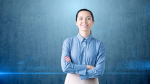 Portrait of young businesswoman with braces