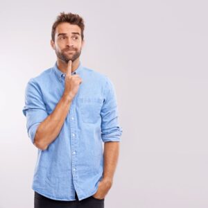 Man wearing curious, thoughtful expression 